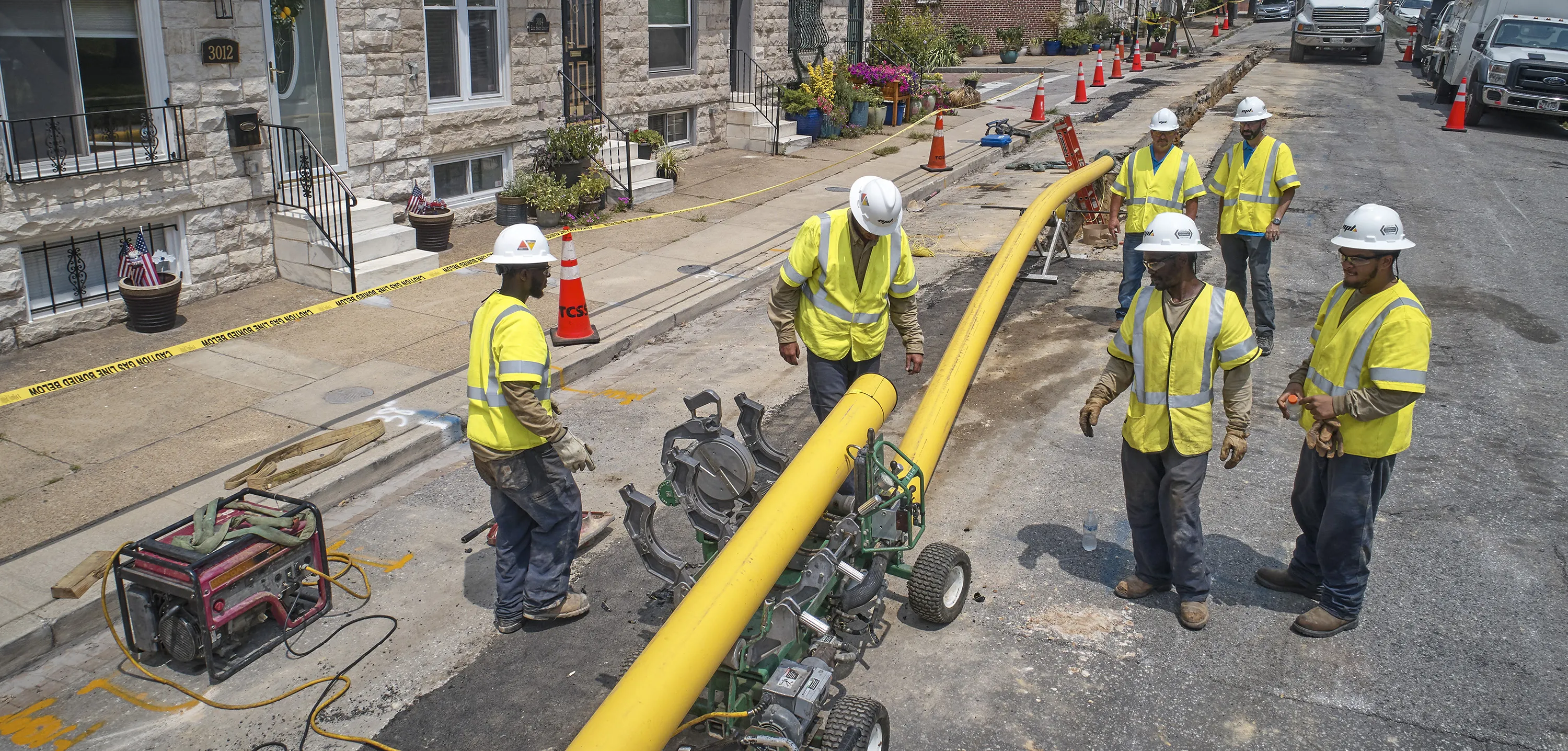 Working with pipe in the street in Baltimore